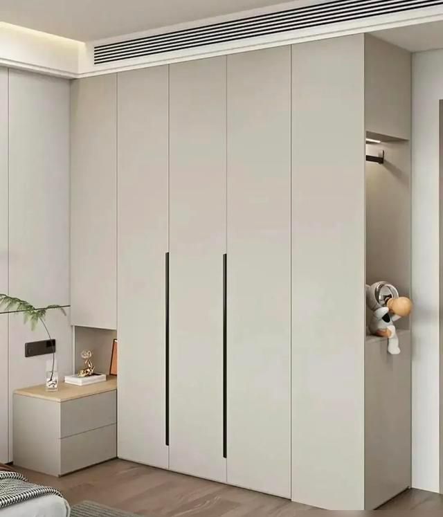 衣柜与床头柜一体化设计,完美解决尺寸烦恼 衣柜加床头柜一体化设计,再也不用担心床头柜的尺寸不合适了 - 家居知识