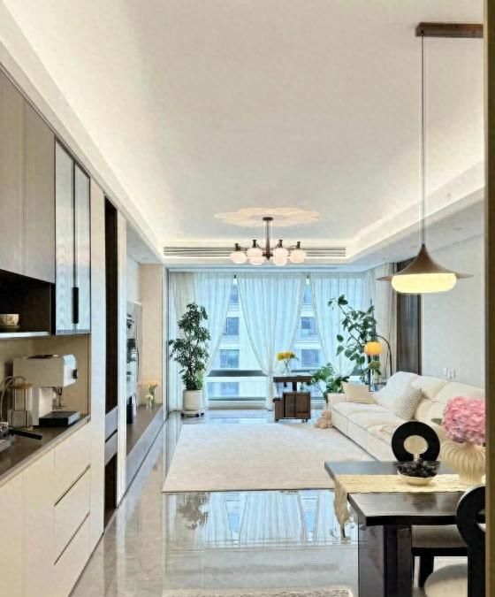 奶油风邂逅烟火气，开放式布局打造越住越大的家