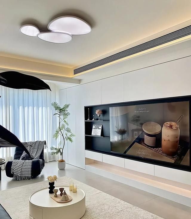 老公坚持把电视墙设计成满墙电视柜，入住后发现真香！ - 家居知识