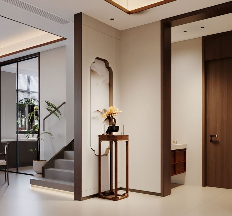 客厅以素雅的米色为主基调，搭配深色实木家具，营造出古典淡雅的氛围。一盏造型别致的仿古宫灯悬挂中央，暖黄灯光洒落在实木茶几上，为空间增添几分禅意。